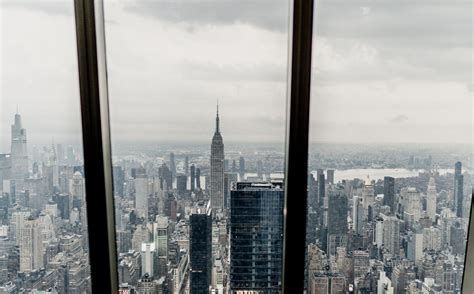 Glass Windows Overlooking City Buildings · Free Stock Photo