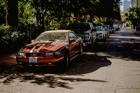Ford Mustang Parked On Street · Free Stock Photo
