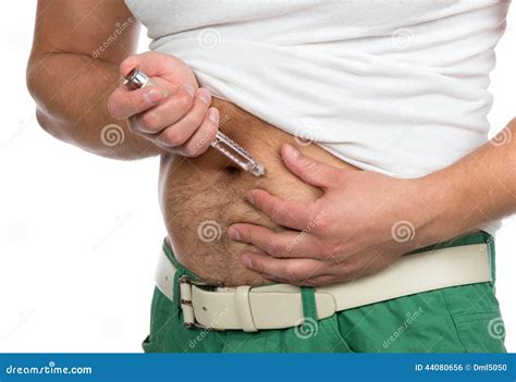 Doctor Making Diabetes Patient Insulin Shot By Syringe Stock Photo