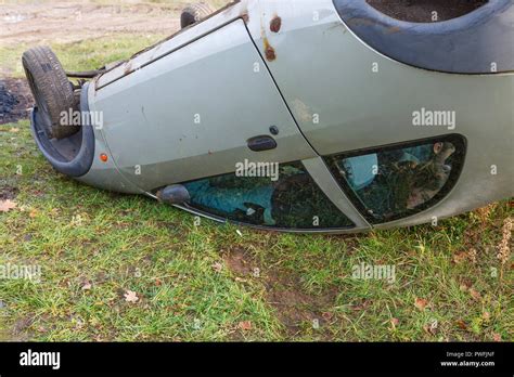 Traffic Accident Car After Rollover Lie On The Roof Stock Photo Alamy