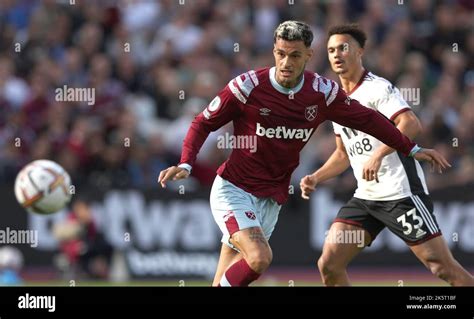 West Hams Gianluca Scamacca Heads The Ball Towards Goal As Fulhams Antonee Robinson Looks On