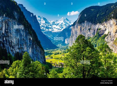 Lauterbrunnen Valley With The Staubbach Waterfall And Snowy Peaks Of