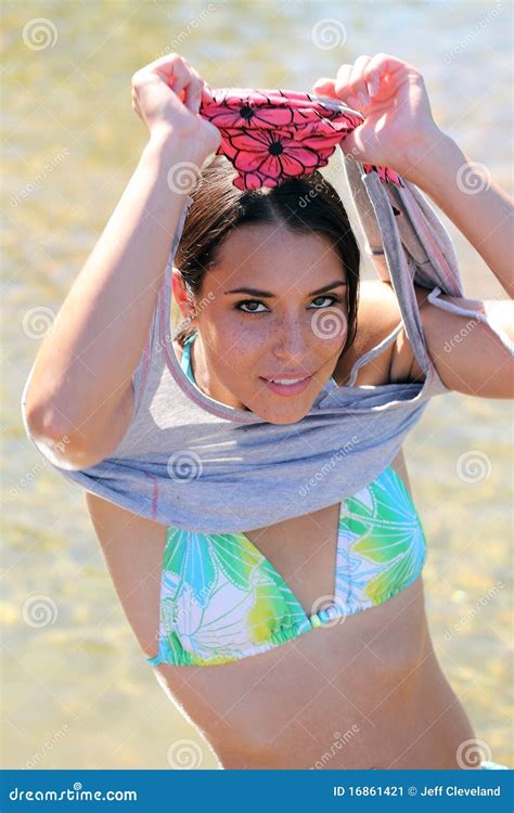 Young Caucasian Woman Removing Shirt Stock Image Image 16861421