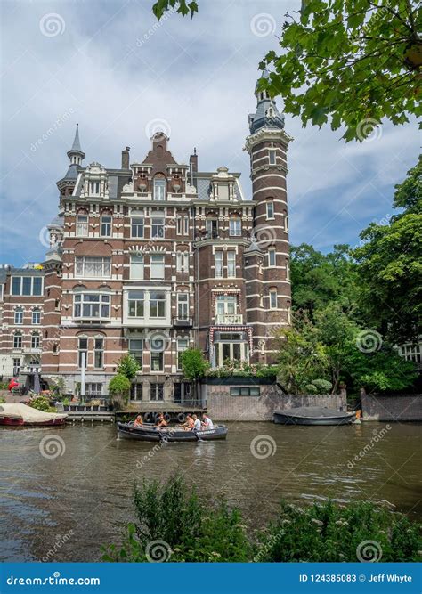 Dutch Canal Buildings in Amsterdam during the Day Editorial Stock Photo