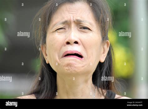 A Crying Diverse Female Senior Stock Photo Alamy