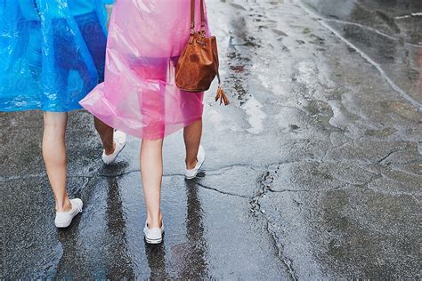 "Girl Friends Explore City In Ponchos In Rain Travel Together Hav" by Stocksy Contributor "Aila ...