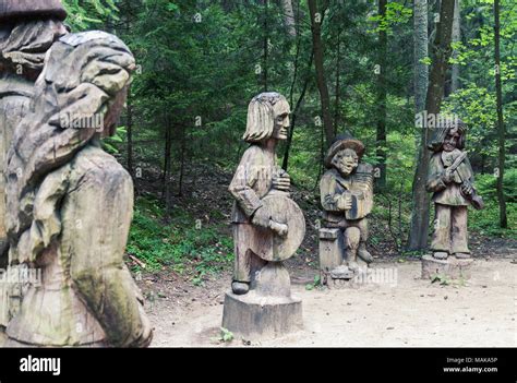 Traditional Lithuanian Wood Carving Art Sculptures Of Folk Musicians In