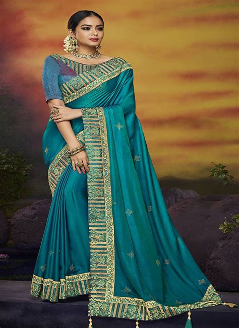 Teal Embroidered Silk Blend Saree With Blouse Monjolika 3037296