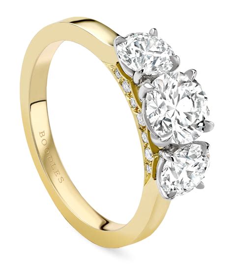 Boodles Yellow Gold Platinum And Diamond Three Stone Engagement Ring