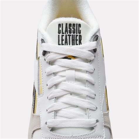 Classic Leather Shoes in Cloud White / Black / Always Yellow | Reebok ...