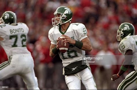 Quarterback Bill Burke Of The Michigan State Spartans In Action News