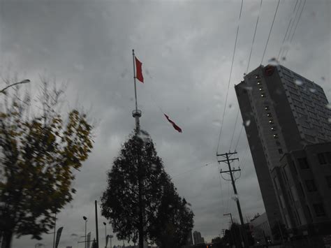 Ripped Canadian Flag flies over Surrey – 107.7 Pulse FM Radio