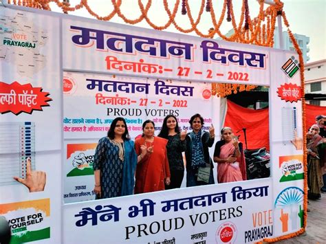 Female Voters Pose For A Photo At Selfie Point After Casting A Vote