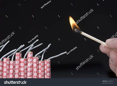 Fireworks Lit With Flame Of Match 03 Stock Photo 2396947 : Shutterstock