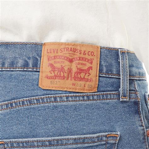 Levi S Herren Jeans In Karotten Stil Mittelblau