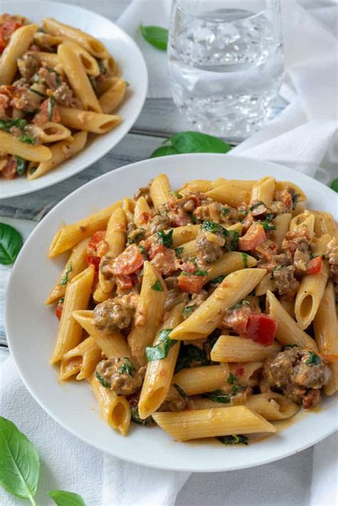 Creamy Italian Sausage And Tomato Pasta Foodtasia