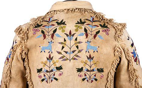 A Santee Sioux Pictorial Beaded And Fringed Hide Jacket C 1890