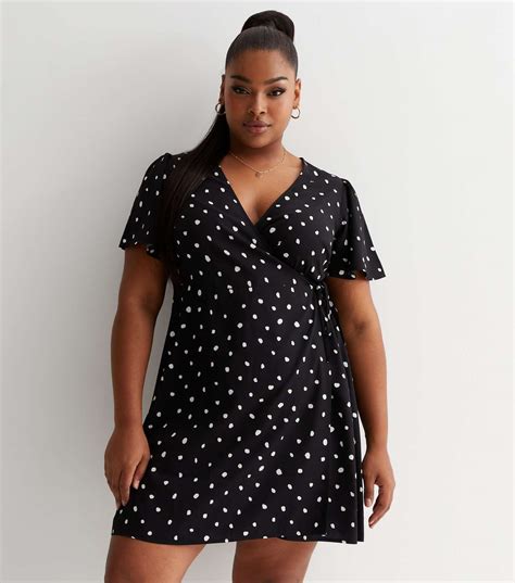 Curves Black Spot Print Angel Sleeve Wrap Mini Dress New Look