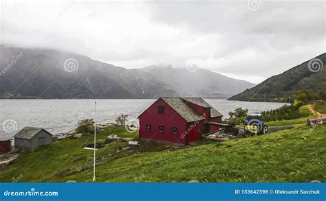 Fragment Of A Fishing Village On The Bank Of A Beautiful Fjord In A