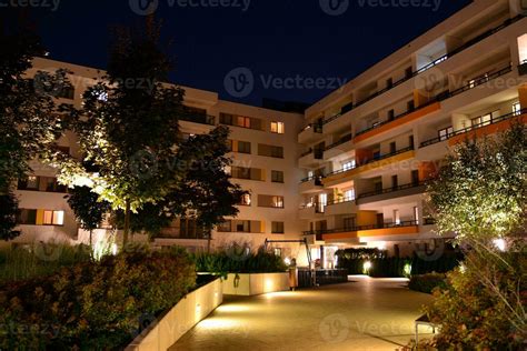 Exterior of apartment building at night 27852702 Stock Photo at Vecteezy