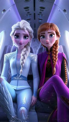 Two Frozen Princesses Sitting On An Airplane Looking At The Camera With