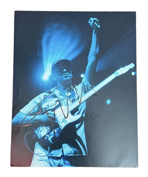 Tom Morello of Rage Against the Machine's Signed Photograph - CharityStars