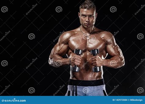 Muscular Fitness Sports Man Atlete With Dumbbell In Fitness Gym