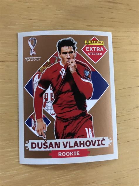 Figurinha Extra Rookie Panini Copa Do Mundo 2022 Dusan Vlahovic Bronze