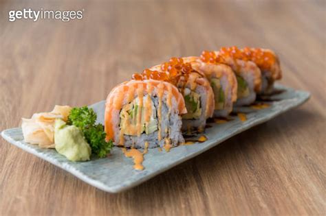 California Salmon Sushi Rolls Stuffed With Salmon Avocado Topping Salmon Roe And Spicy Cream