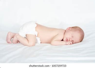 Naked Baby Sleeping On Bed Stock Photo Shutterstock