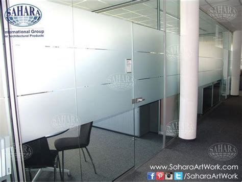 Office Door And Partitions Made From Clear Glass And Sandblasted