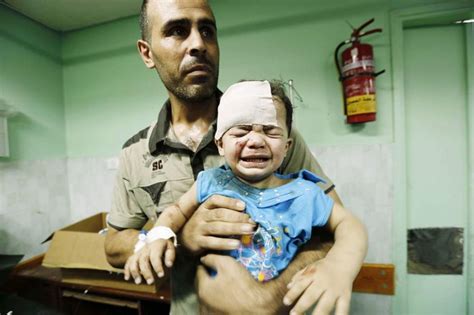 Children Of War Heartbreaking Photographs From Gaza