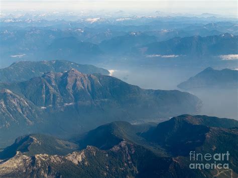 Aerial view of coast mountain ranges in BC Canada Photograph by Stephan ...