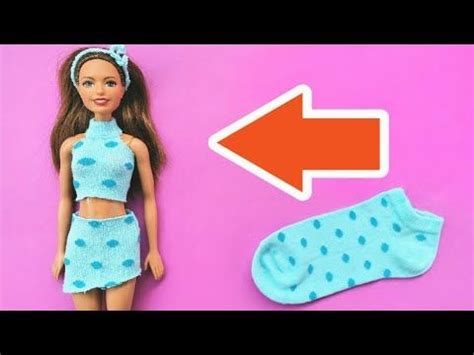 A Barbie Doll Next To A Pair Of Socks With An Arrow Pointing Towards