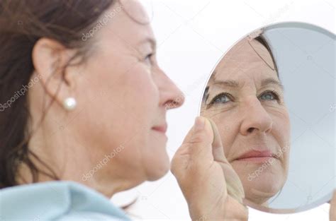 Portrait Mature Woman In Mirror Stock Photo By Roboriginal