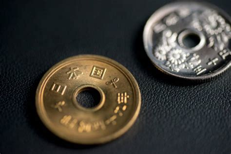 Japan 50 Yen Coin Stock Photos, Pictures & Royalty-Free Images - iStock