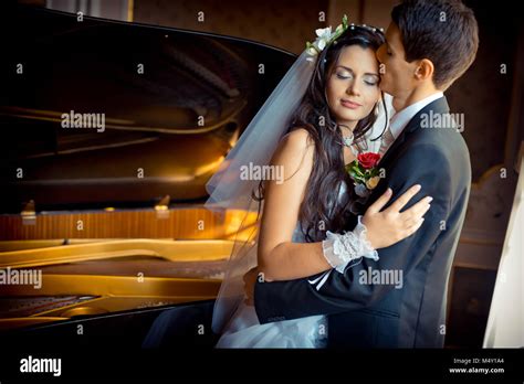 Sensual Wedding Portrait The Handsome Groom Is Tenderly Kissing His