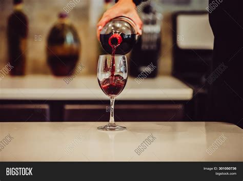 Woman Pouring Red Wine Image And Photo Free Trial Bigstock