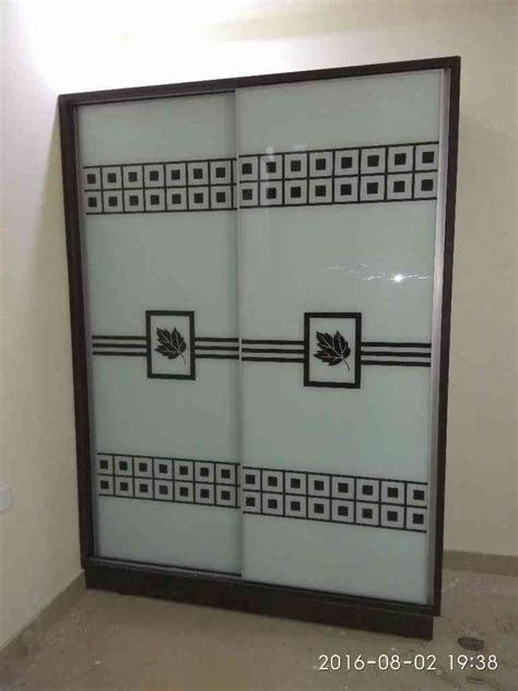 Sliding Door Wardrobe Design by Rubic Wall Decor | KreateCube