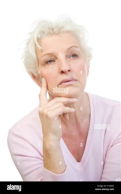 A Mature Woman Looking Thoughtfully Into The Distance Stock Photo Alamy