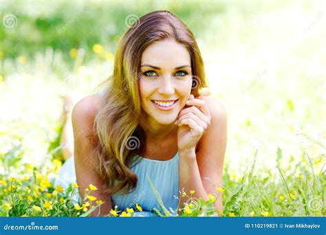 Young Woman In Blue Dress Lying On Grass Stock Image Image Of Green