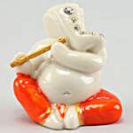 Buy Send Flute Ganesha Idol With Dry Fruits Potli Online Fnp