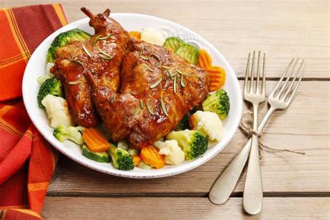 Roasted rabbit with vegetables — Stock Photo © agneskantaruk #60398889