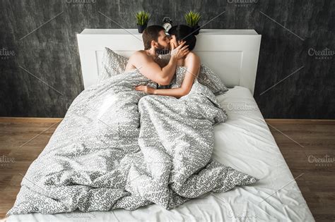 Couple In Love Kissing In Bed ~ People Photos ~ Creative Market