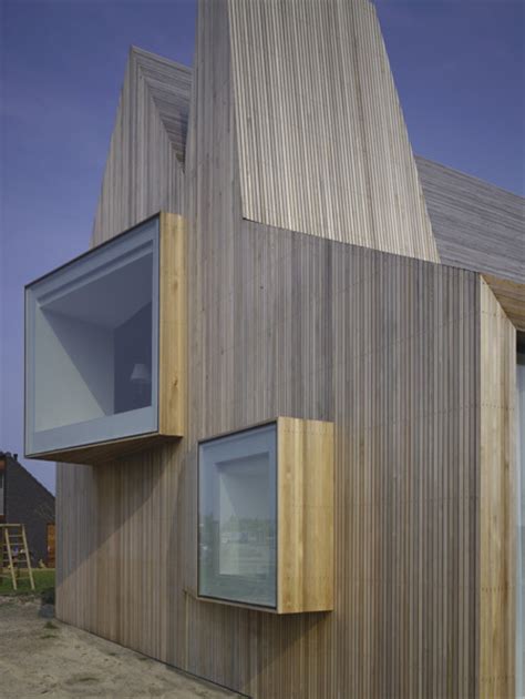 Modern Wooden House Design with Original Shape - DigsDigs