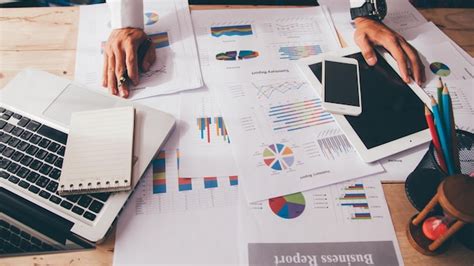 Premium Photo Midsection Of Businessman Working At Desk In Office