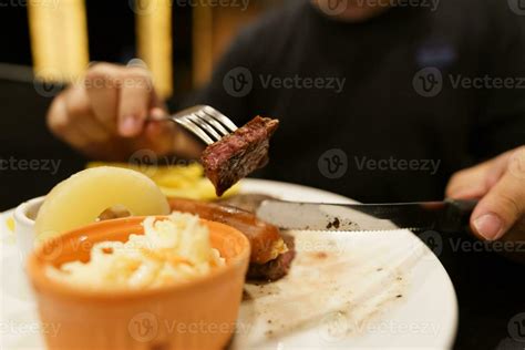 Man Eating Steak Stock Photos Images And Backgrounds For Free Download