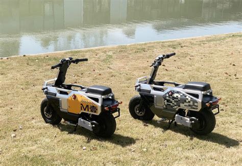 mini electric motorcycle 'm-one' folds in seconds and can fit in the car's trunk