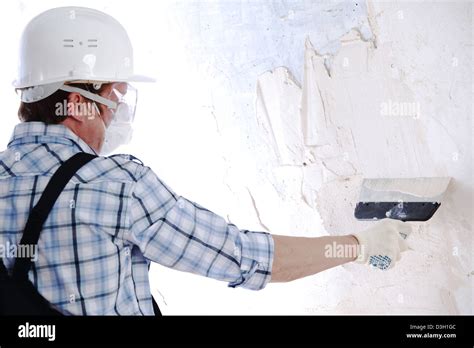Work Aligns With A Spatula Wall Stock Photo Alamy