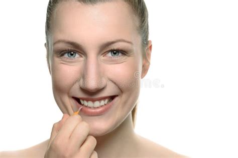 Woman Cleaning Between Her Teeth With An Interdental Brush Stock Image